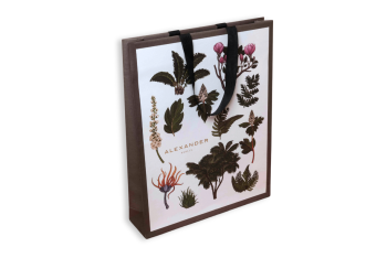 Sac en papier avec motif végétal et poignées noires