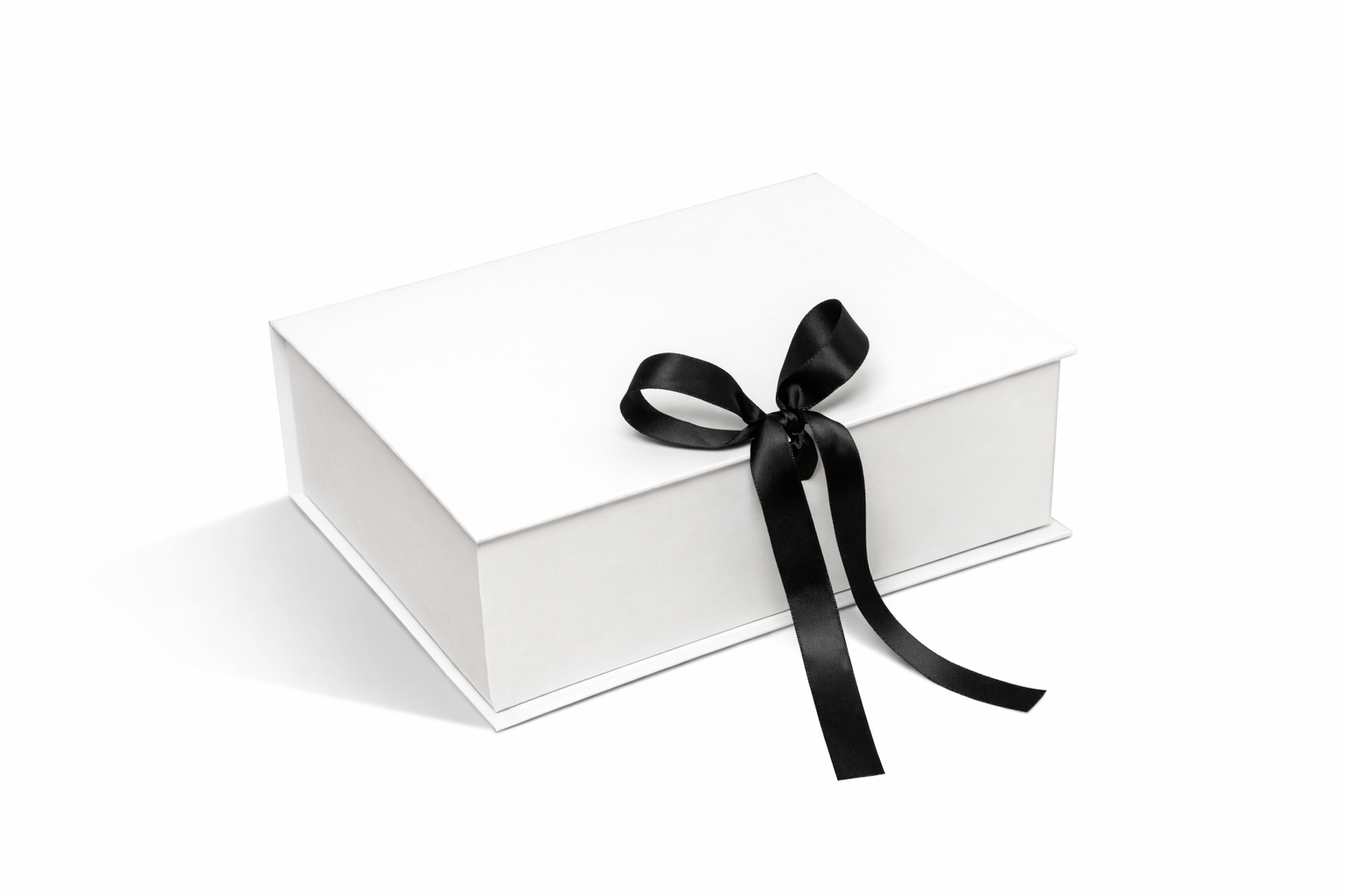 Boîte magnétique blanche avec un nœud noir pour emballages cadeaux