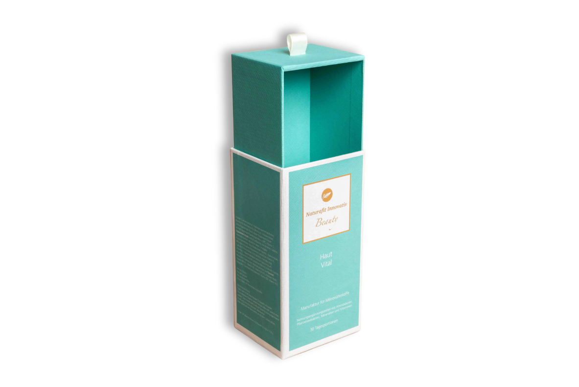Boîte magnétique turquoise avec rabat ouvert, ornée de détails dorés